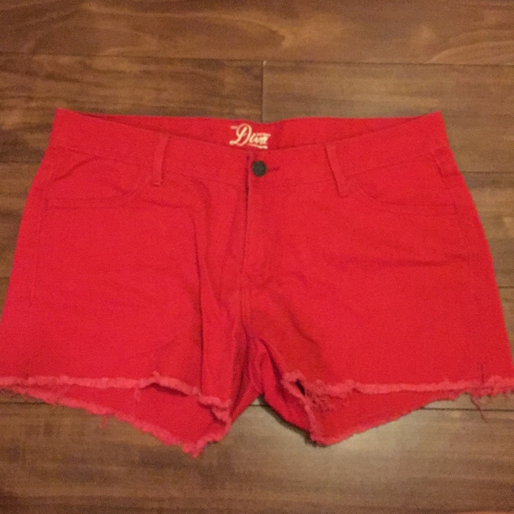Red cutoff shorts